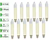 A collection of 12 candle-shaped light bulbs with cream-colored bases and clear glass tops, arranged in two rows against a white background. Text labels are present on the left side of the image. Produktbild-Vorschau