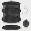 A black, multi-tiered drying net for herbs, shown both assembled and folded, with accompanying dimensions and a hook. Náhľad obrázku produktu