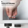 A hand is shown using an Allen wrench to adjust the leveling foot of a piece of furniture, likely a cabinet or shelf. Produktbild-Vorschau