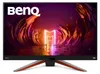A gaming monitor displaying a vibrant, futuristic landscape with a large 'M' shaped structure in the center. The BenQ logo is visible in the top left corner. Anteprima dell’immagine prodotto