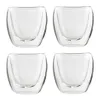 Four clear, double-walled espresso cups are arranged in a 2x2 grid against a white background. Anteprima dell’immagine prodotto