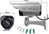 A silver dummy CCTV camera with dimensions indicated by measurement lines. Náhled obrázku produktu