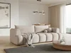 A modern living room with a sofa, coffee table, and artwork. Produktbild-Vorschau