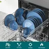 A set of blue ceramic dishes is neatly arranged in a dishwasher rack. Voir les images du produit