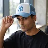 Polo Del Marchio New Era Del Modello League Ess Trucker Blu Anteprima dell’immagine prodotto 5