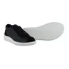 A black Ecco sneaker and its white sole are displayed against a white background. Náhled obrázku produktu