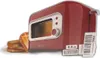 A red toaster with toast on a plate next to it. Voir les images du produit