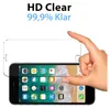A hand is holding a screen protector over a smartphone displaying app icons. Produktbild-Vorschau