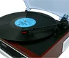 A close-up shot of a record player with a vinyl record on it. Podgląd zdjęcia produktu
