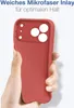 A hand holding a red phone case. Produktbild-Vorschau