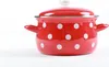 A red and white polka dot pot with a lid, shown from the side against a white background. Anteprima dell’immagine prodotto