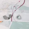 Close-up of curtain accessories and fabric. Produktbild-Vorschau