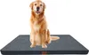 A golden retriever dog sitting on a gray dog bed. Produktbild-Vorschau
