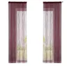 Two burgundy string curtains hanging in front of a window. Produktbild-Vorschau