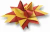 A folded paper star ornament made of red and yellow paper. Náhľad obrázku produktu
