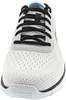 A close-up, front-facing view of a white and black athletic shoe. Anteprima dell’immagine prodotto
