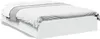 A white bed frame with drawers, viewed from the side. Produktbild-Vorschau