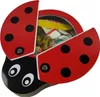 A ladybug-shaped tin filled with candy. Produktbild-Vorschau