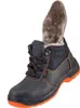 A single black winter work boot with orange accents and a furry lining is shown against a white background. Produktbild-Vorschau