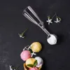 An ice cream scoop with several scoops of ice cream in a cone, decorated with small white flowers. Náhľad obrázku produktu