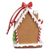 A Christmas ornament in the shape of a gingerbread house. Produktbild-Vorschau