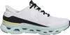 A single white athletic shoe is shown from the side against a white background. Voir les images du produit