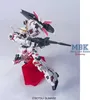 A model of a white and red robot with a gun and shield, posed on a red stand. Náhled obrázku produktu
