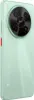 The back of a light green smartphone with a prominent circular camera module. Podgląd zdjęcia produktu