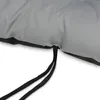A close-up view of a gray cushion with black ties. Produktbild-Vorschau