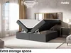 A bedroom scene with a bed that has its storage compartment open, revealing the mattress and topper. Produktbild-Vorschau