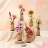 A collection of wooden 3D flower models arranged in vases on a draped surface. Náhľad obrázku produktu