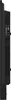 Side view of a black electronic device with ventilation slits. Voir les images du produit
