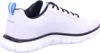 Side view of a white athletic shoe with black and blue accents. Anteprima dell’immagine prodotto