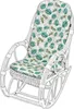 A white wicker rocking chair with a cushion featuring a tropical leaf pattern. Anteprima dell’immagine prodotto