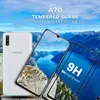 A Samsung Galaxy A70 phone and two screen protectors are displayed against a backdrop of a scenic mountain landscape with a river. Produktbild-Vorschau
