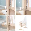 Collage of images showing how to assemble and the final product of a baby bassinet. Produktbild-Vorschau