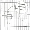 A close-up view of a metal clip attached to a wire cage, with an inset showing a detailed view of the clip mechanism. Náhľad obrázku produktu
