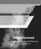 A close-up view of a range hood with smoke being drawn into it, highlighting its performance. Produktbild-Vorschau