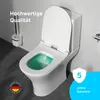 A white toilet with green liquid in the bowl, next to a toilet brush holder. Text overlays indicate quality and warranty. Produktbild-Vorschau