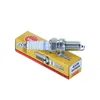 A spark plug and its packaging are shown against a white background. Produktbild-Vorschau