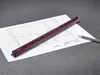 A triangular ruler is placed on a blueprint with a pencil nearby. Produktbild-Vorschau