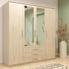 A light wood wardrobe with mirrored doors and three drawers, set against a light green wall. Voir les images du produit