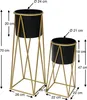 Two black plant pots on gold metal stands with dimensions indicated. Voir les images du produit
