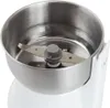 A close-up view of the interior of a white coffee grinder, showing the stainless steel bowl and the blades. Produktbild-Vorschau