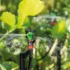 A close-up of a garden sprinkler watering plants. Produktbild-Vorschau