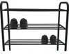 A black three-tier shoe rack with shoes on each tier. Náhľad obrázku produktu