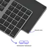 A close-up view of a wireless numeric keypad, highlighting its design and features. Náhled obrázku produktu