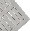 A close-up view of a wooden table surface with a slatted design. Produktbild-Vorschau