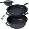 A stack of cast iron cookware, including a lidded pot and two frying pans, on a white background. Náhled obrázku produktu