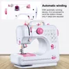 A close-up view of a white and pink sewing machine with instructional callouts and text describing its automatic winding feature. Náhled obrázku produktu